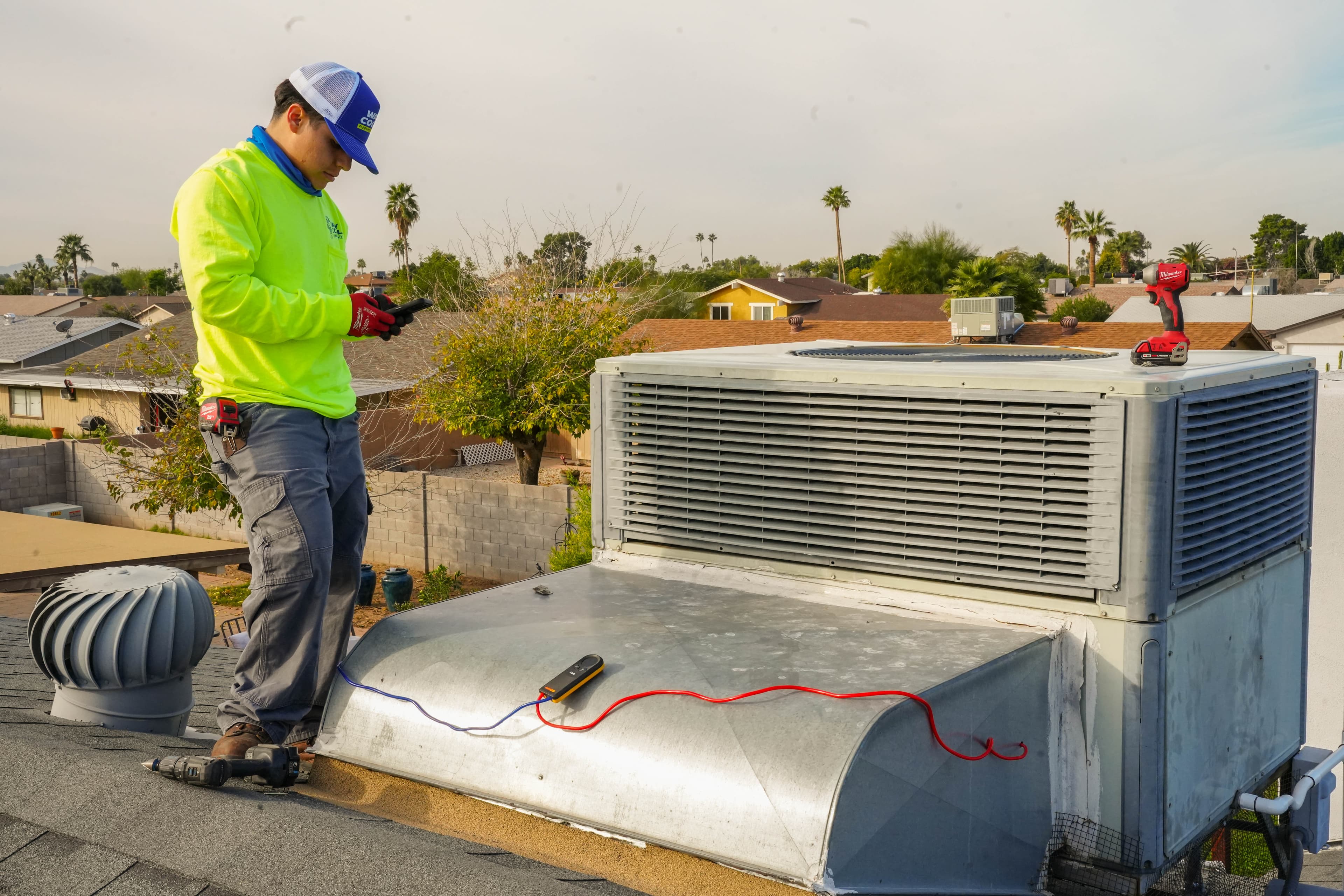 Way Cool home performance specialist conducting an energy audit