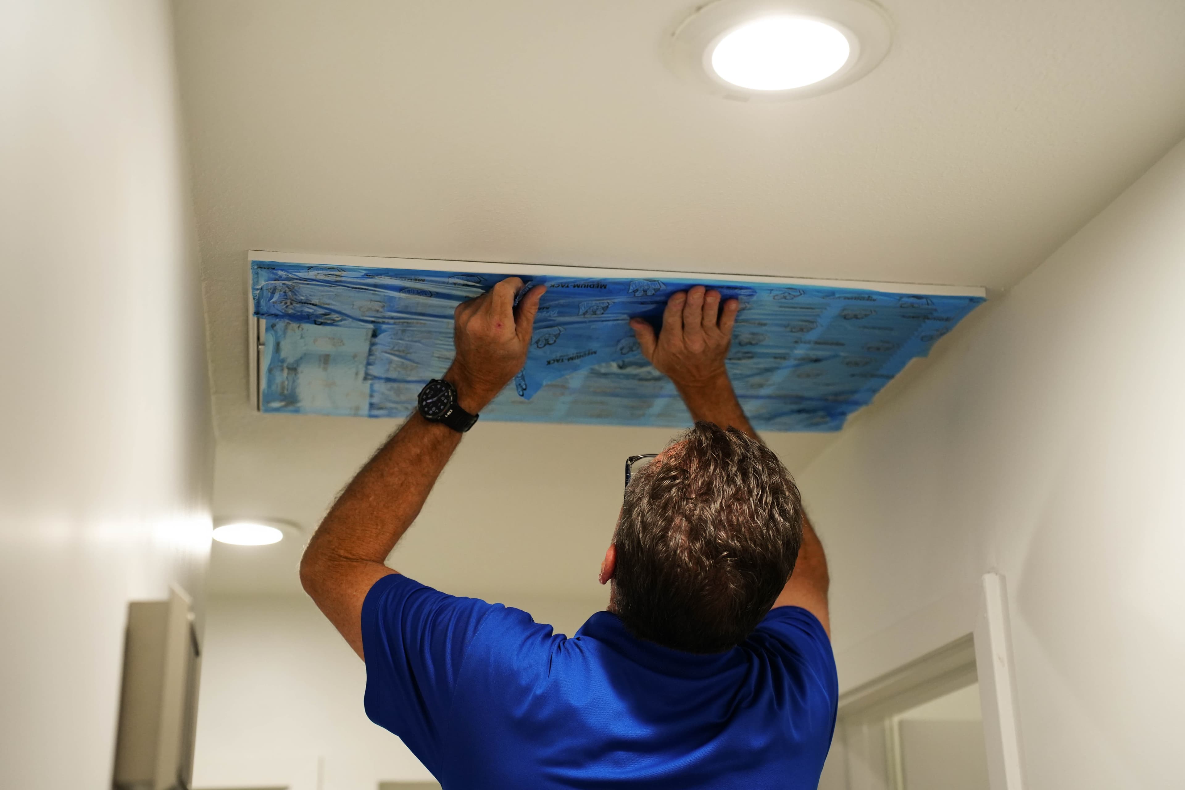 Way Cool tech inspecting attic insulation