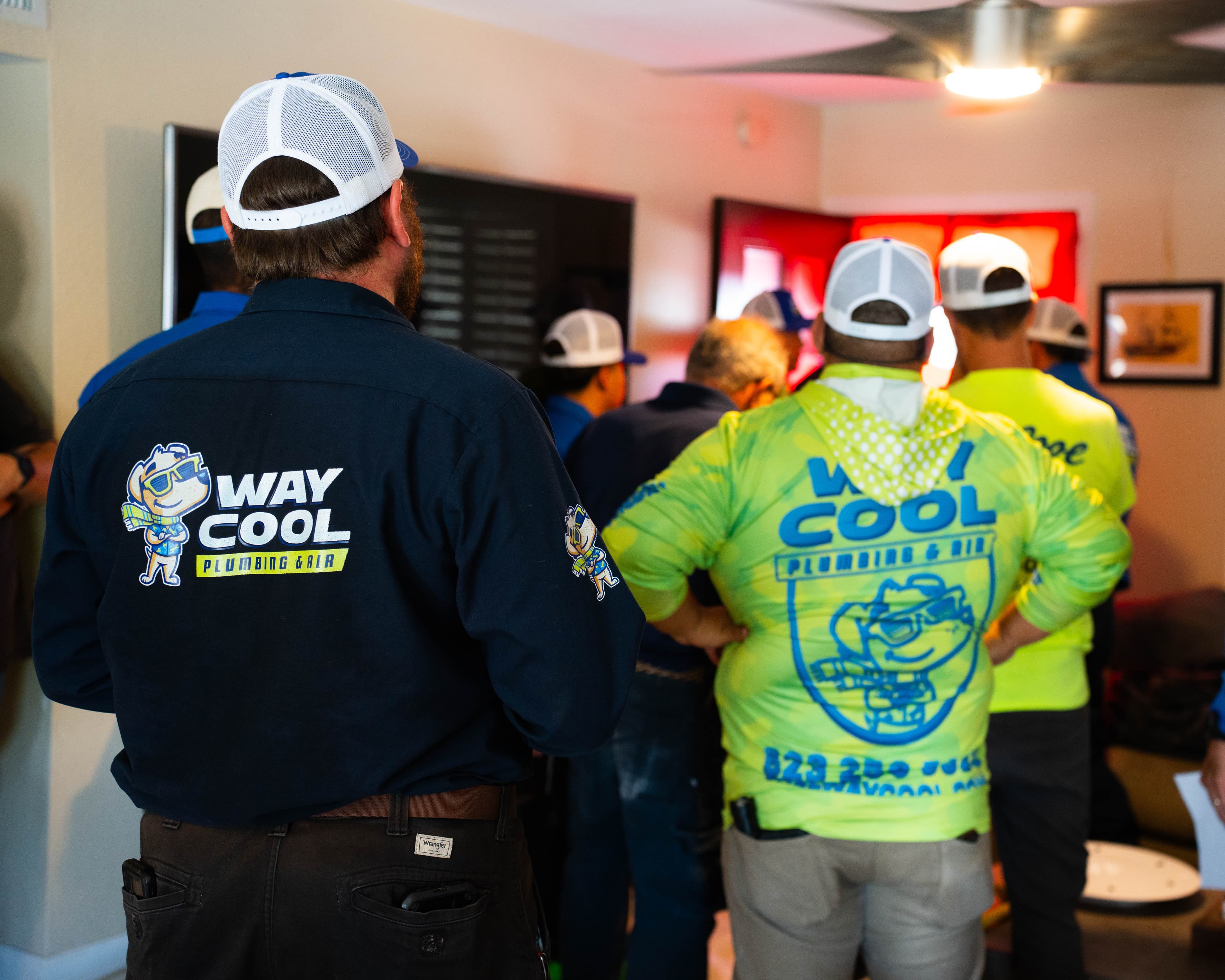 Way Cool home performance team in branded uniforms