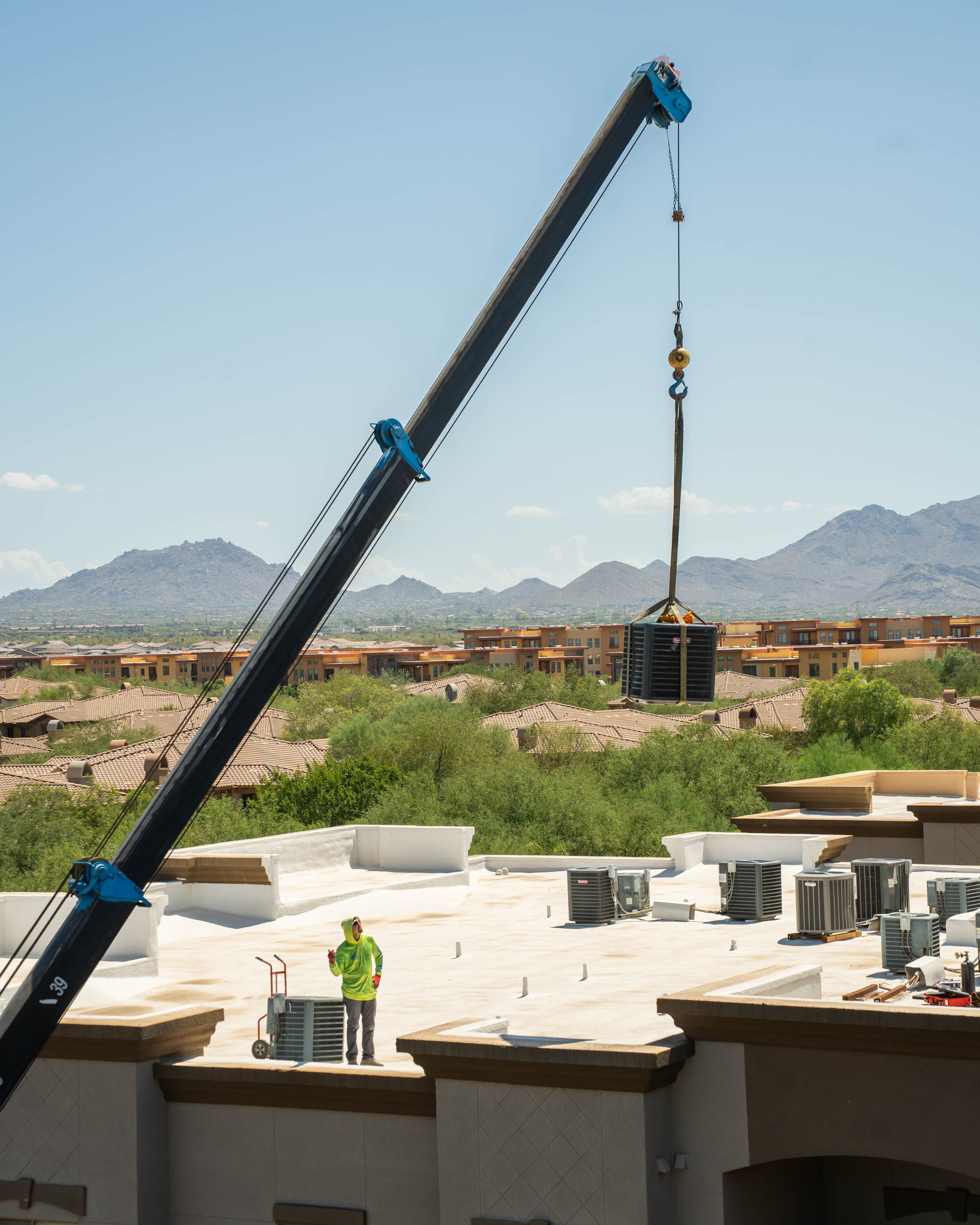 Rooftop condenser crane lift